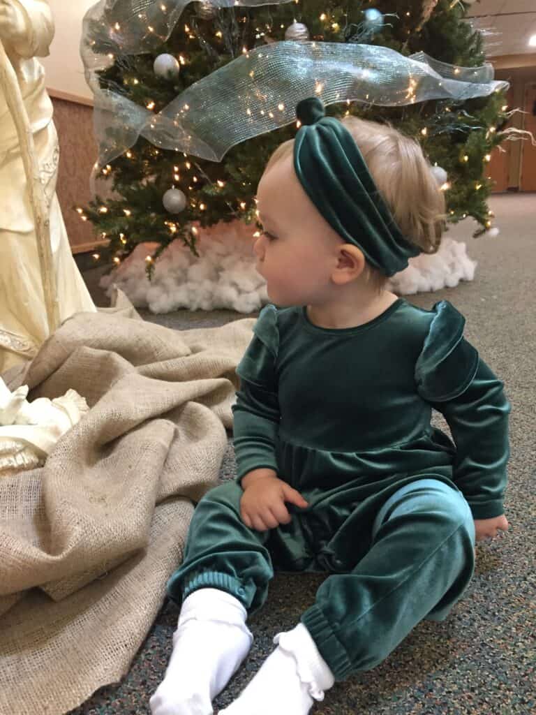 baby at christmas tree