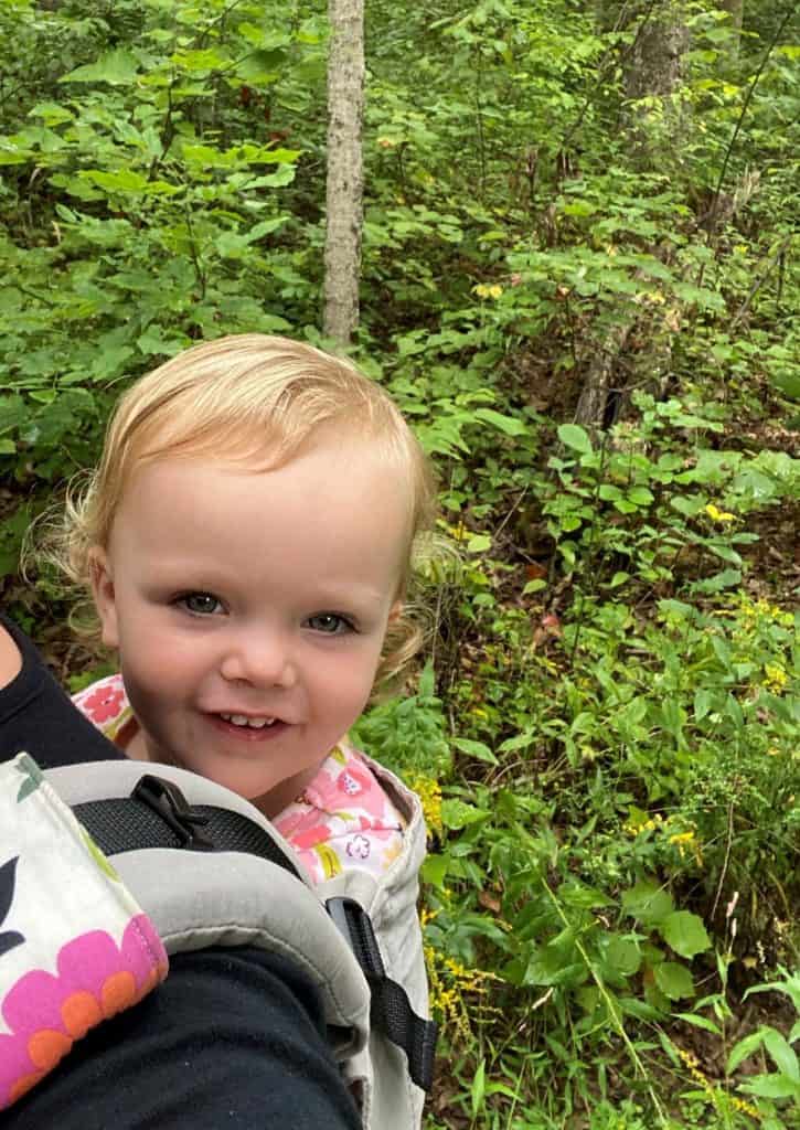 baby in hiking backpack as things to do in bloomington indiana with kids