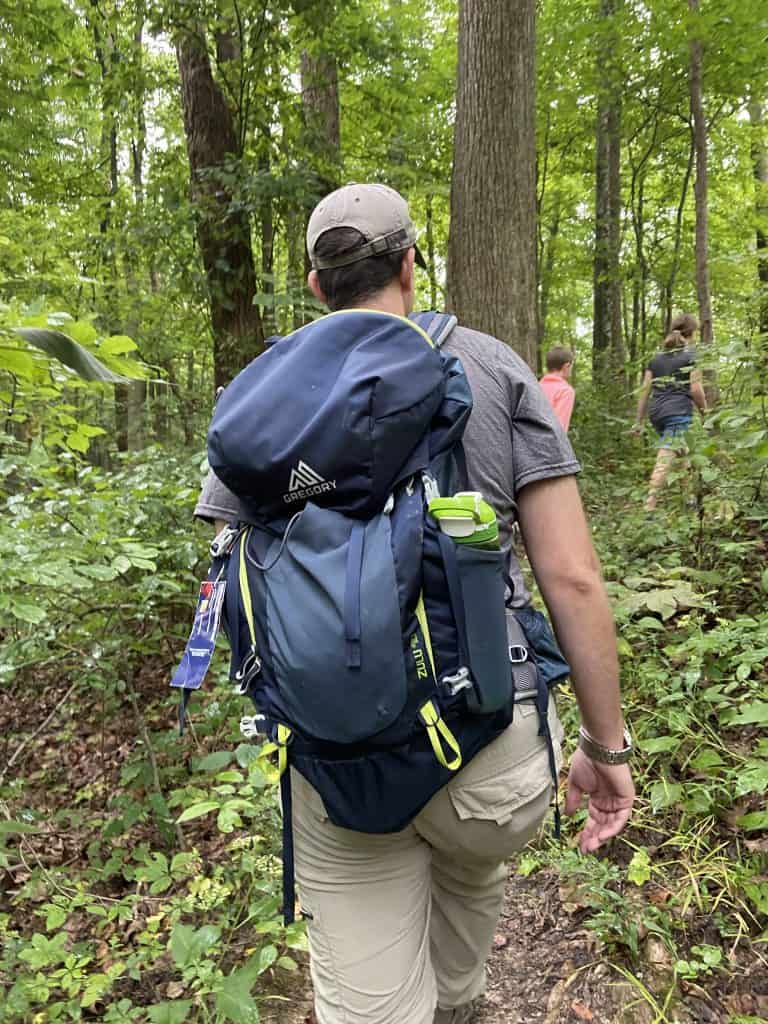 man with backpack on morgan monroe state forest
