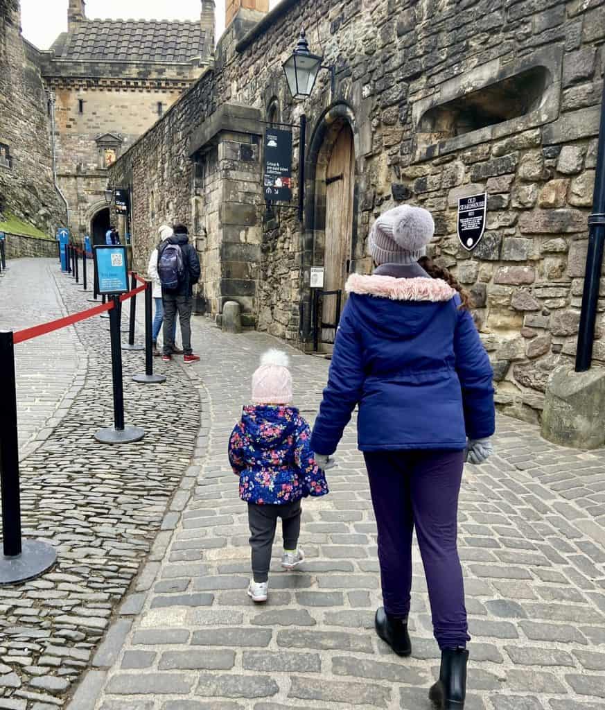 Edinburgh Castle kids walking up hill