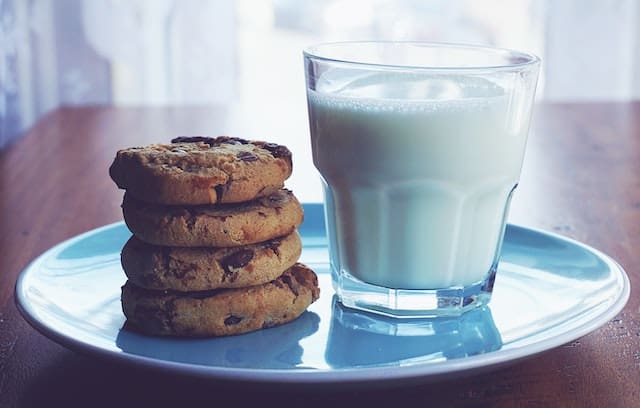cookies and milk on a plate