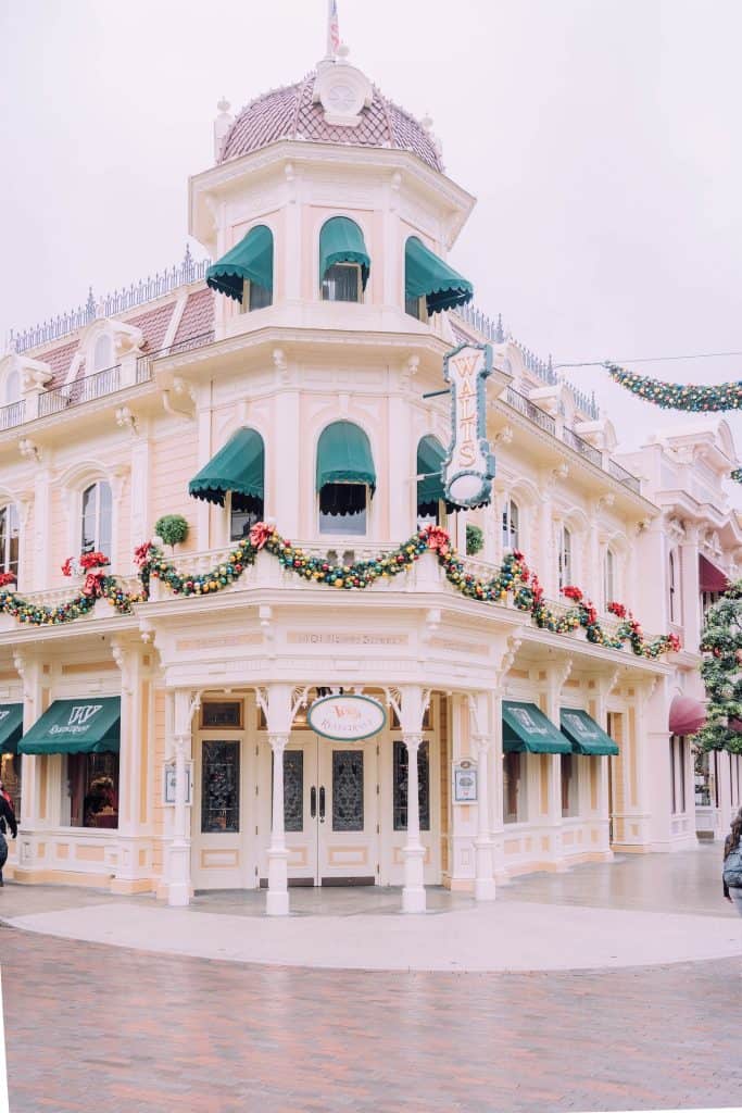 white building decorated for Christmas at Disneyland