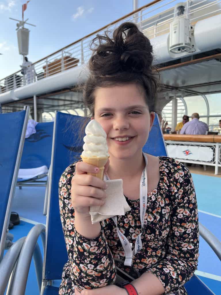 girl with ice cream on ship