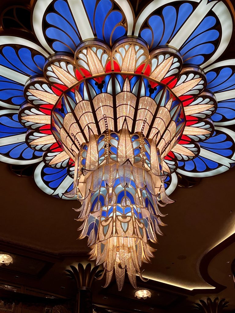 blue and red glass chandelier on cruise ship