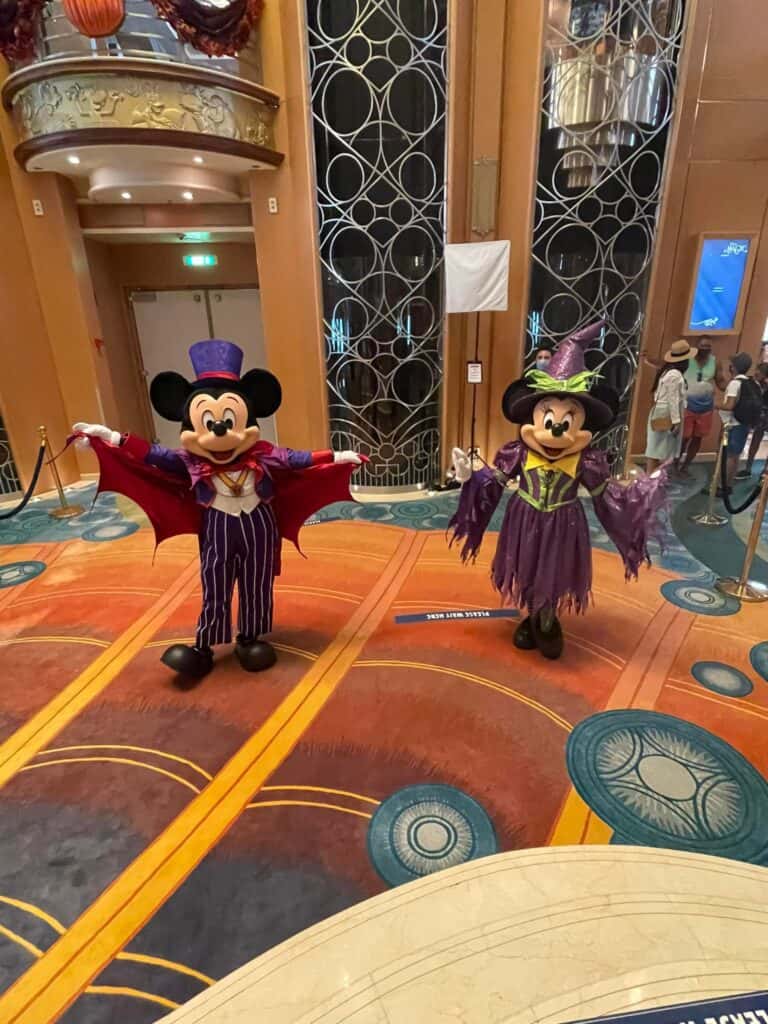 Mickey and Minnie Mouse in Halloween costumes
